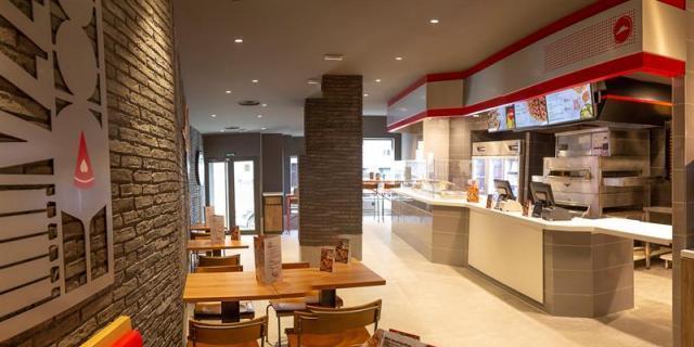 La alianza entre Telepizza y Pizza Hut abre local en Madrid