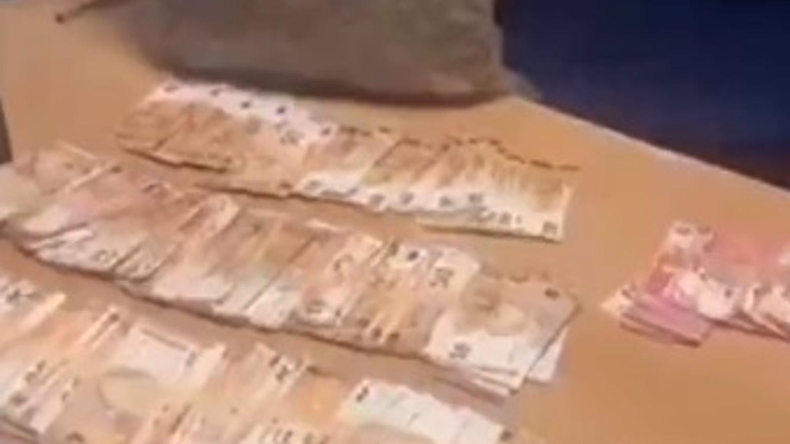 Detenido en Ciudad Lineal un hombre con un kilo de marihuana en su coche y casi 15.000 euros