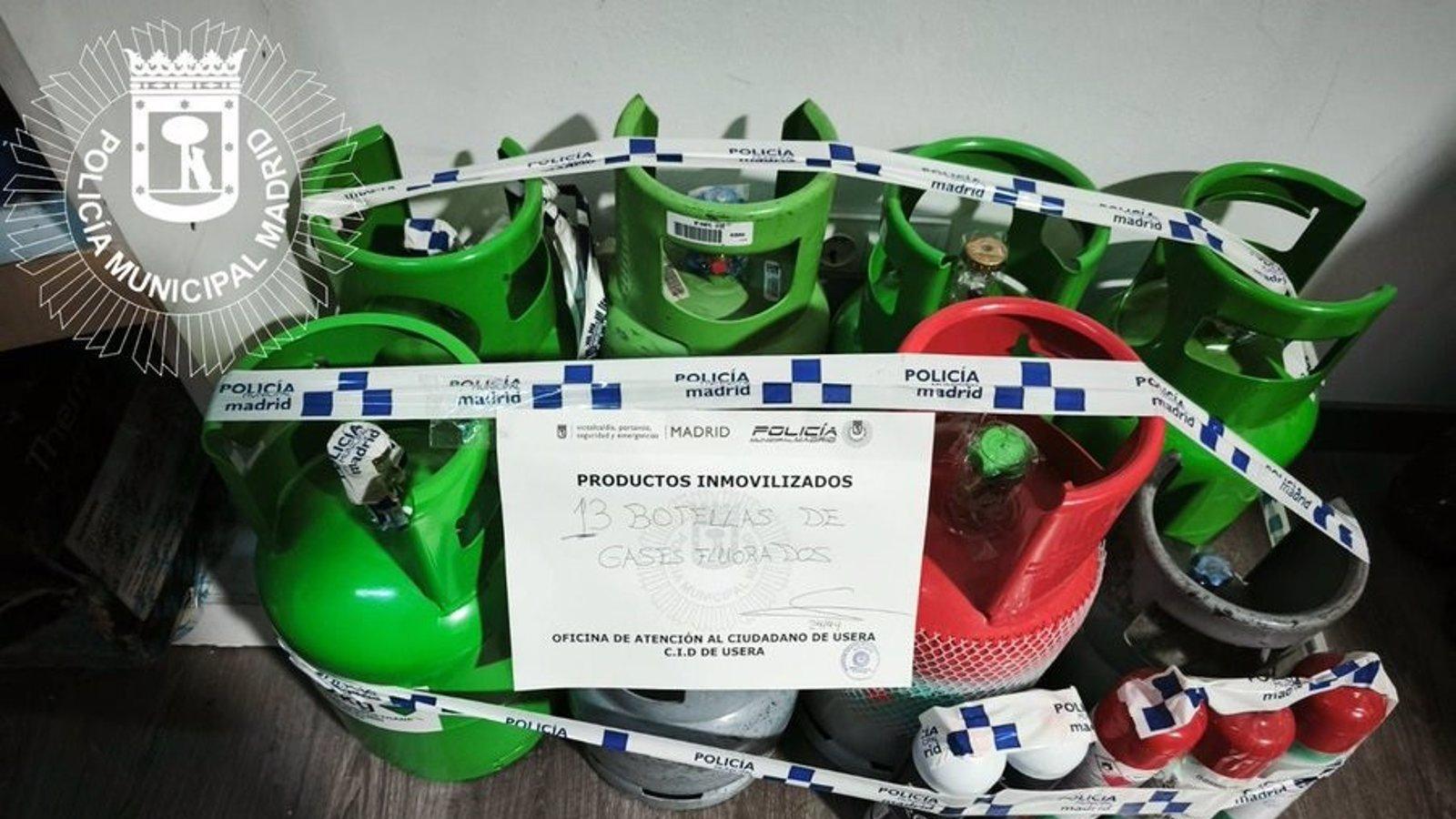 Clausuran un taller clandestino en Usera con trece botellas de gas fluorado ilegal